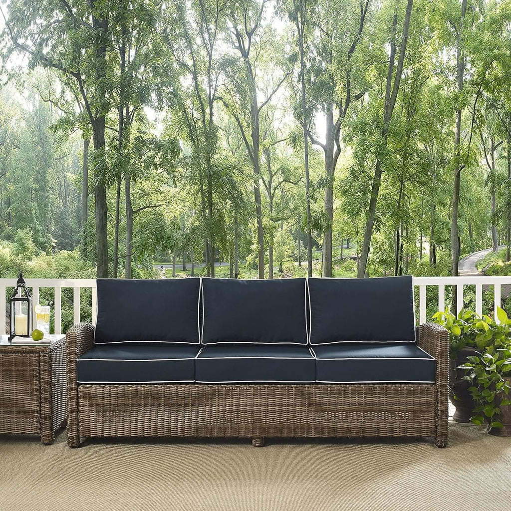 Brown Wicker Outdoor Sofa with Navy Cushions for Comfort